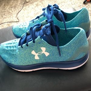 Women’s UA running shoes.